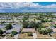 Expansive aerial view of waterfront community with lush landscaping and canals at 21838 Edgewater Dr, Port Charlotte, FL 33952