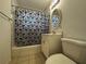Bathroom with shower and tub combo, and tile floors at 21838 Edgewater Dr, Port Charlotte, FL 33952