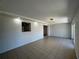 Spacious room featuring recessed lighting, a pass-through, and a door to the exterior at 21838 Edgewater Dr, Port Charlotte, FL 33952
