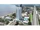 Beautiful aerial view of a modern condo development, overlooking the water and highway at 2910 W Barcelona St # 403, Tampa, FL 33629