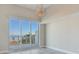 Bright, airy room with sliding glass doors leading to a large balcony and scenic water views at 2910 W Barcelona St # 403, Tampa, FL 33629