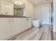 Elegant bathroom features a freestanding tub, dual vanities, and a separate shower area, bright and luxurious at 2910 W Barcelona St # 403, Tampa, FL 33629
