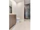 Modern bathroom featuring sleek vanity with walk-in shower at 2910 W Barcelona St # 403, Tampa, FL 33629