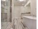 Beautiful bathroom with a freestanding tub, glass shower, and modern fixtures, offering a spa-like experience at 2910 W Barcelona St # 403, Tampa, FL 33629