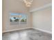 Bright bedroom featuring tile floor, and sunny window view at 2910 W Barcelona St # 403, Tampa, FL 33629