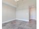 Spacious bedroom features tile floors and neutral walls at 2910 W Barcelona St # 403, Tampa, FL 33629