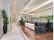 Gorgeous lobby with marble floors, custom woodwork, contemporary lighting, and designer accents at 2910 W Barcelona St # 403, Tampa, FL 33629