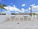 Outdoor kitchen with stainless steel grills, bar top counter, and sink for entertaining at 2910 W Barcelona St # 403, Tampa, FL 33629