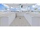 Outdoor kitchen featuring white cabinetry, stainless steel appliances, and marble countertops at 2910 W Barcelona St # 403, Tampa, FL 33629