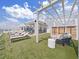 Rooftop area featuring lounge chairs, a pergola, seating, and clear blue skies at 2910 W Barcelona St # 403, Tampa, FL 33629