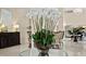 Close up of a large vase with orchids in the grand lobby near the piano at 3301 Bayshore Blvd # 2108B, Tampa, FL 33629