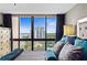 Bedroom view showcases city views, stylish furnishings, and natural light at 3301 Bayshore Blvd # 2108B, Tampa, FL 33629