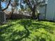 Lush backyard providing ample space for outdoor activities at 3316 S Shamrock Rd, Tampa, FL 33629