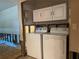 Convenient laundry room equipped with a washer and dryer at 3316 S Shamrock Rd, Tampa, FL 33629