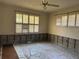 Inviting room with natural light, ceiling fan, and neutral palette at 3316 S Shamrock Rd, Tampa, FL 33629