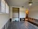 Room features a closet and view into adjacent room at 3316 S Shamrock Rd, Tampa, FL 33629