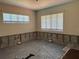 Spacious room with natural light streaming through the windows at 3316 S Shamrock Rd, Tampa, FL 33629