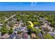 Aerial view of a residential neighborhood with tree lined streets on a clear day at 3504 N 12Th St, Tampa, FL 33605