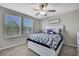 Comfortable bedroom with natural light, creating a relaxing retreat at 35965 Saddle Palm Way, Zephyrhills, FL 33541