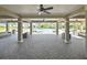 Community area featuring comfortable seating, ceiling fans, and views of the pool, providing a relaxing space for residents at 35965 Saddle Palm Way, Zephyrhills, FL 33541