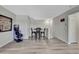Charming dining area with barstools, and a minimalist design, great for casual meals and socializing at 35965 Saddle Palm Way, Zephyrhills, FL 33541