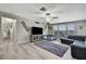 Spacious living room offering stylish decor, neutral colors, and an open layout perfect for gatherings at 35965 Saddle Palm Way, Zephyrhills, FL 33541