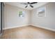 Bright bedroom with two windows and ample closet space at 3707 14Th Se Ave, Largo, FL 33771