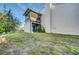 Exterior view of the backyard showing the back of the home and patio at 4319 Harbor House Dr, Tampa, FL 33615