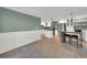 Contemporary living area with a new kitchen and dining area, tile floors, and modern appliances at 4319 Harbor House Dr, Tampa, FL 33615