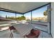 Outdoor patio features a view of the tennis courts and surrounding landscape at 4319 Harbor House Dr, Tampa, FL 33615