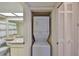 A stackable laundry setup next to the bathroom, and a closet at 4405 W Fair Oaks Ave # 9, Tampa, FL 33611