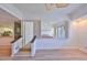 Bright open space connects the living room, stairs, and kitchen, with access to bedrooms via a shared window at 4405 W Fair Oaks Ave # 9, Tampa, FL 33611