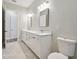 Modern bathroom features double sinks and vanity with ample counter space at 4559 Mitcher Rd, New Port Richey, FL 34652