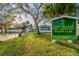 Gulf Harbors Beach Club entrance, showcasing lush landscaping and a glimpse of the beautiful community at 4559 Mitcher Rd, New Port Richey, FL 34652
