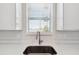 Kitchen sink with a view to the outside at 4559 Mitcher Rd, New Port Richey, FL 34652