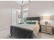 Comfortable bedroom with soft bedding, bedside tables, and a bright window view at 4824 Benito Ct, Bradenton, FL 34211