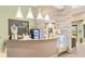 Well-lit cafe area featuring stylish decor and views of the community at 4824 Benito Ct, Bradenton, FL 34211