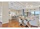Spacious open concept living and kitchen area with water view and modern furnishings at 4824 Benito Ct, Bradenton, FL 34211