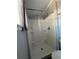 Bathroom stall shower with built-in shelving at 5808 N 17Th St, Tampa, FL 33610