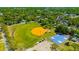 Aerial view of community park with baseball and basketball areas at 5912 N Lynn Ave, Tampa, FL 33604