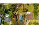 Aerial view of the property, highlighting the pool and yard at 5912 N Lynn Ave, Tampa, FL 33604