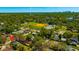 Aerial view of the neighborhood featuring the house, fields and community at 5912 N Lynn Ave, Tampa, FL 33604