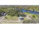 Scenic aerial view of a park featuring a green gazebo, winding paths, and a waterfront at 604 W Hilda St, Tampa, FL 33603