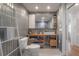 Modern bathroom features a standing shower and a floating vanity at 604 W Hilda St, Tampa, FL 33603