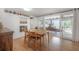 Charming dining room with hardwood floors and sliding glass doors to the outdoor patio at 604 W Hilda St, Tampa, FL 33603