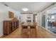 Dining area with hardwood floors, stylish decor, and easy access to the outdoor spaces at 604 W Hilda St, Tampa, FL 33603