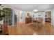 Dining area with hardwood floors, stylish furniture, and access to other living spaces at 604 W Hilda St, Tampa, FL 33603