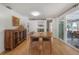 Dining room with hardwood floors, sideboard and sliding doors to patio at 604 W Hilda St, Tampa, FL 33603