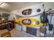 Organized garage space featuring kayak storage, shelving, and ample room for equipment and accessories at 604 W Hilda St, Tampa, FL 33603