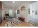 Cozy living room with stylish furnishings, a barn door, and plenty of natural light at 604 W Hilda St, Tampa, FL 33603